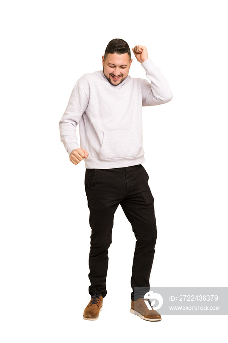 Full body adult latin man cut out isolated dancing and having fun.