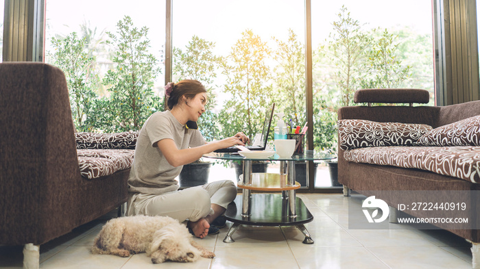 Coronavirus. Business woman working from home. Asian woman in quarantine for protective coronavirus. Cleaning her hands with sanitizer gel. Asian woman student leaning online at home.