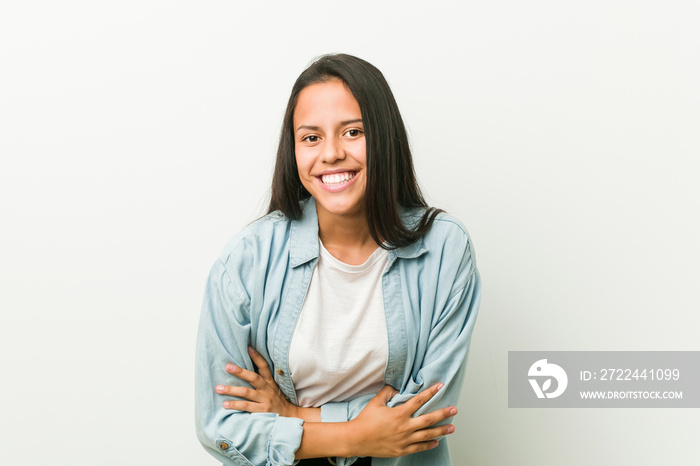 Young hispanic woman laughing and having fun.