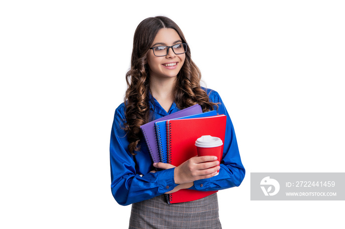 photo of school student girl with homework and coffee cup. school student girl