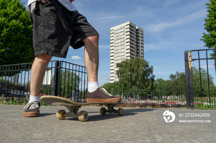 Young man skateboarding in skate park