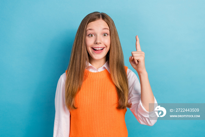 Portrait of smart positive person toothy smile point finger brilliant excellent solution isolated on blue color background