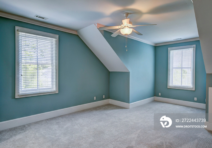 Empty upstairs attic bedroom with windows, place your own furniture.