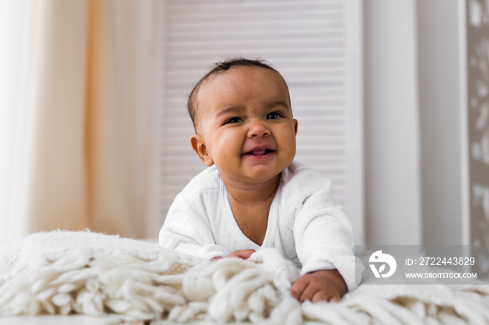 Portrait of a mixed race baby boy