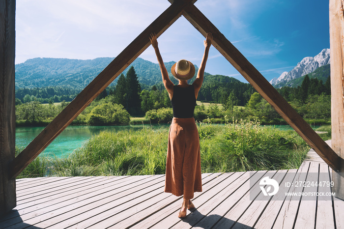 Woman enjoying freedom on nature outdoors. Travel Slovenia Europe.