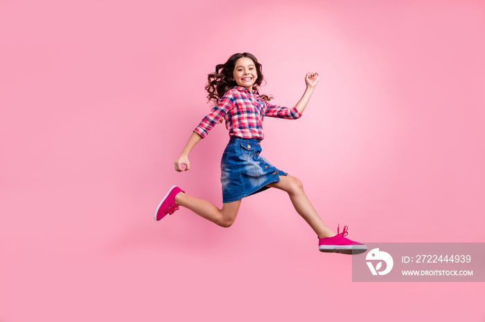 Full length body size view photo cool optimistic child funny funky careless holiday summer travel free time weekend activity move motion excited modern jeans clothes isolated pink sneakers background