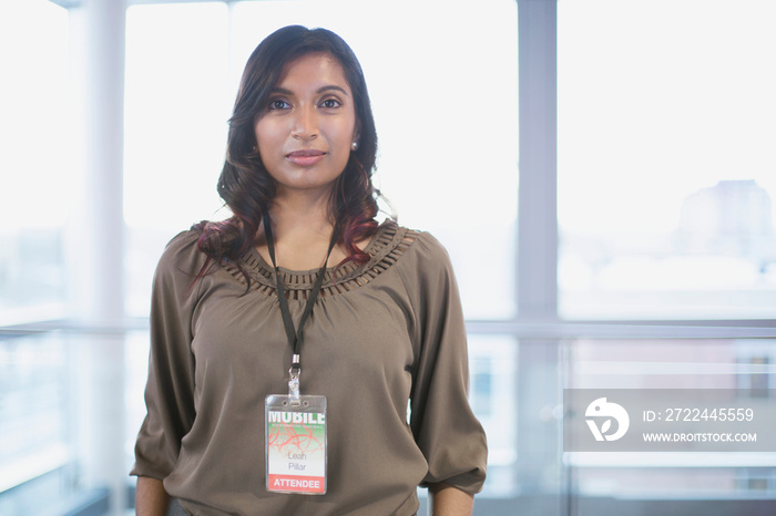 Portrait of young adult woman with serious look.