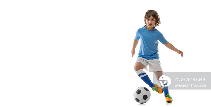 Flyer with little sportsman, football soccer player, boy playing football isolated on white studio background. Concept of sport, game, hobby