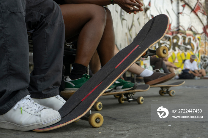 Group of young people with skateboards