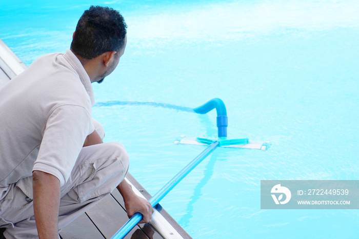 Pool cleaner during his work