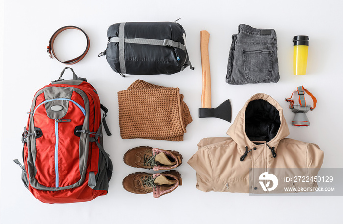 Equipment for hiking on white background