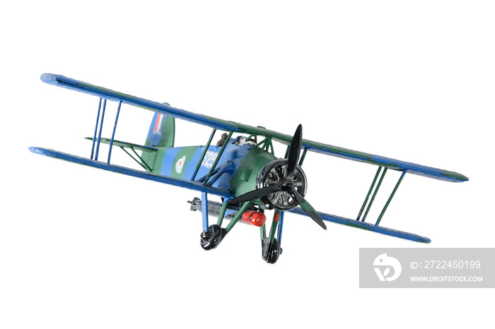 Blue plastic biplane isolated on the white background