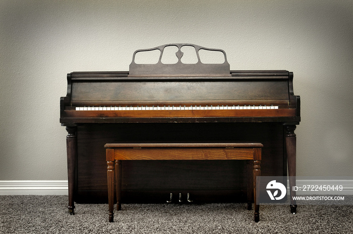 Old Vintage Piano in Home With Rich Wood Tones