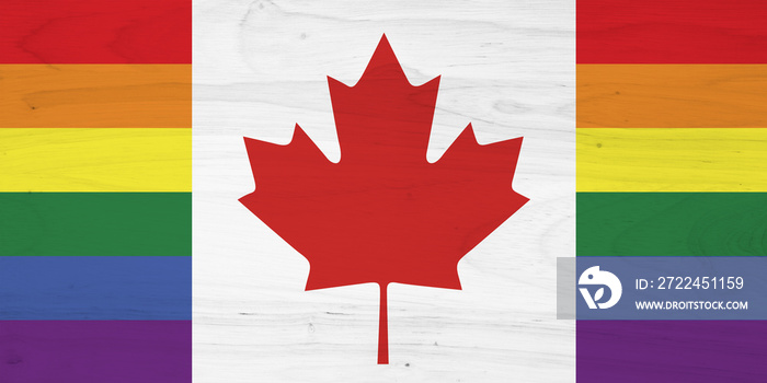 A Canadian pride flag on with wood texture