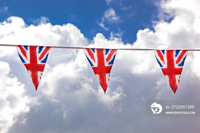 Union Jack bunting and summer sky background.