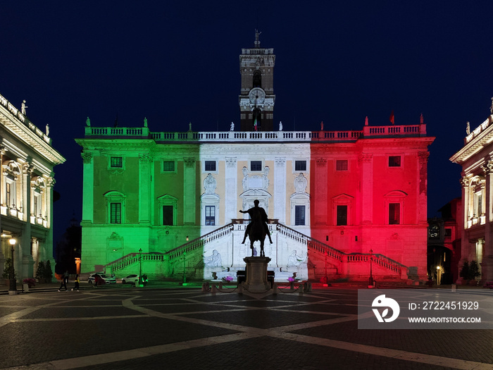 Campidoglio in Rome at night with italian flag