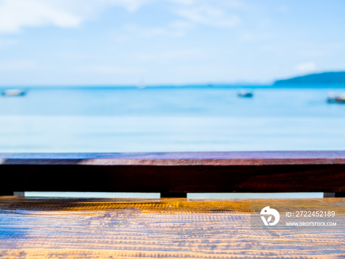 Empty wooden table top bar on seascape background