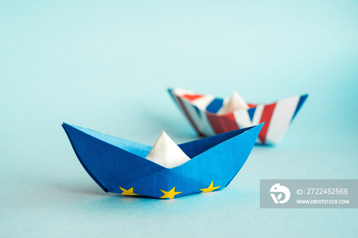 paper ship in Flags of European Union and United Kingdom, Brexit UK EU concept