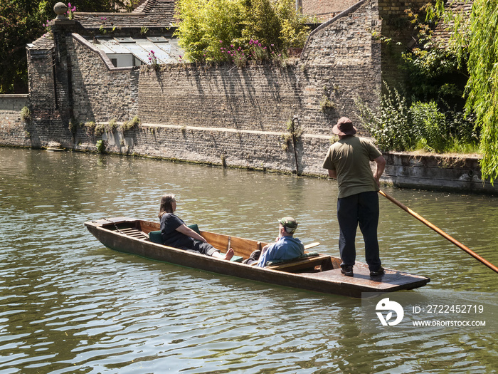 Tourist punting on the River Cam, Cambridge England UK