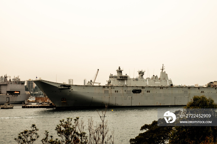 A dramatic shot of the Australian navy battleship at the Sydney Harbour