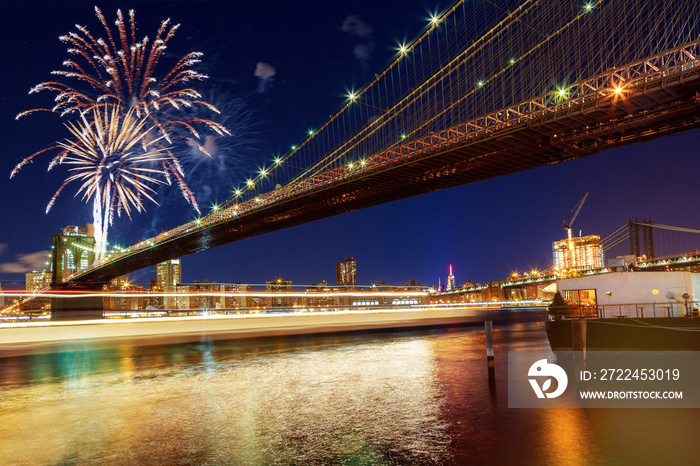 Amazing celebration fireworks New York City Brooklyn bridge and Manhattan skyline night Hudson River