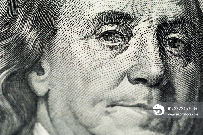 A close view of engraving portrait of Ben Franklin of old one hundred us dollars banknote