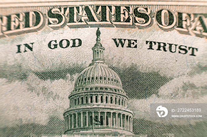 Back reserve side detail of American national currency banknote dollars bills. Symbol of wealth and prosperity. In God we trust words.