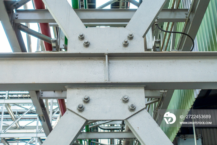 Joint of steel structure with bolt and nut at construction site