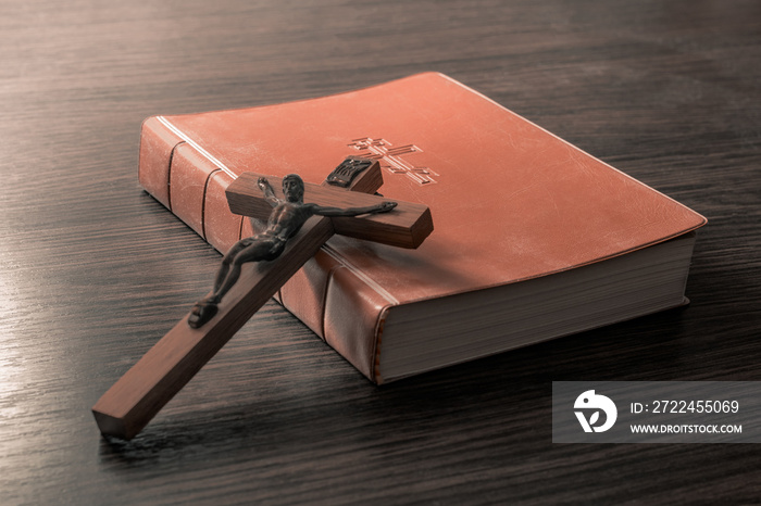 Old Holy Bible and Crucifix. Concept for religious events