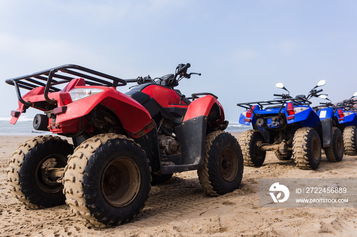 ATVs on the beach, Legzira, Morocco