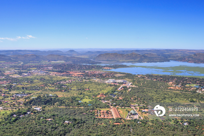 Hartbeespoort Dam surrounded by urban area,  Magaliesberg mountain, North West Province, South Africa
