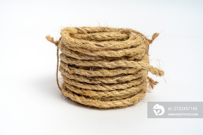 Coil of fiber rope sisal small on isolated white background