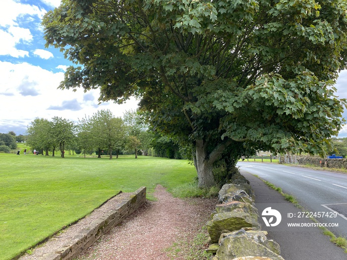 Split view of, Raikes Lane, and the East Bierley golf course near, Dewsbury, Yorkshire, UK