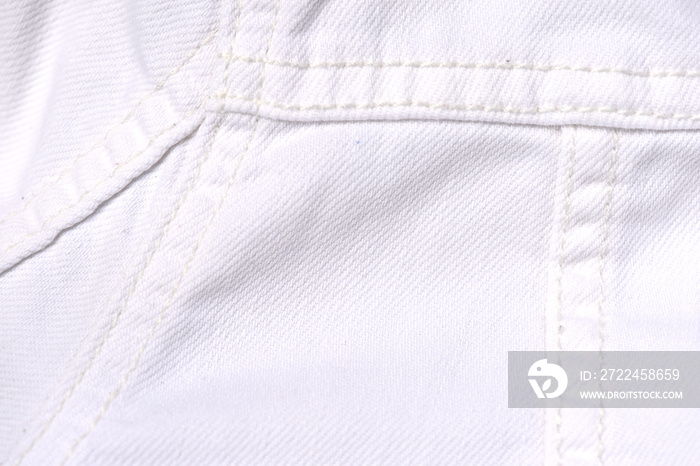 White jeans jacket texture close up. Denim background