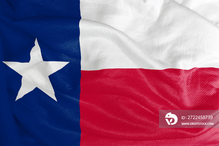 The Texas flag is a blue vertical stripe on the hoist side, with two horizontal stripes to the right with white at the top and red at the bottom.