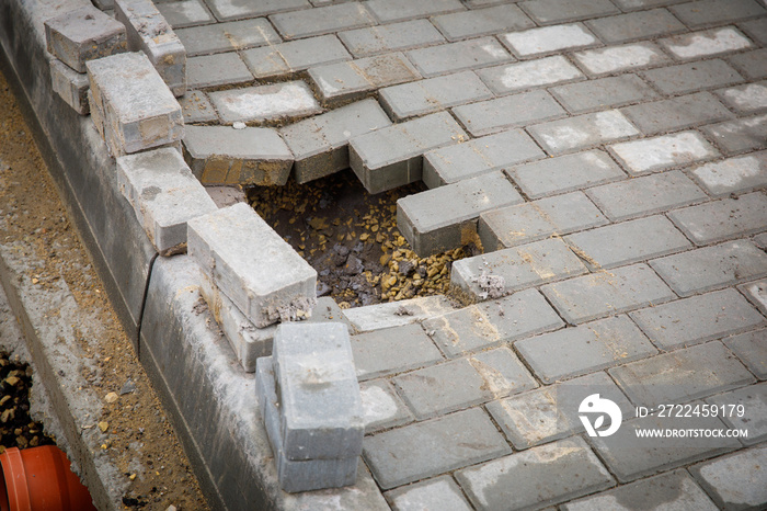 Poorly performed repair work. Destroyed paving slabs.