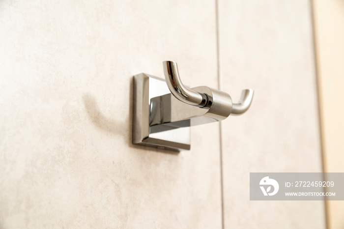 chrome towel hook in the bathroom