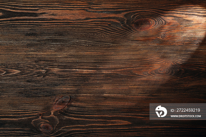 Light beam on wooden background