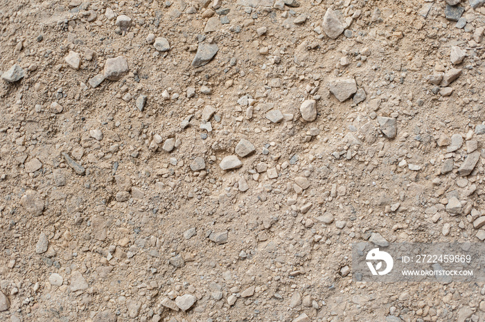 Gravel and pebbles background pattern, small and big sand