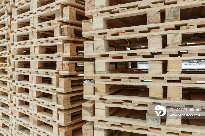 New wooden paletes stacked to be used in a warehouse and transportation.