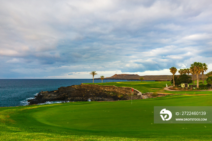 Golf course along rocky coastline. Tenerife, Spain.