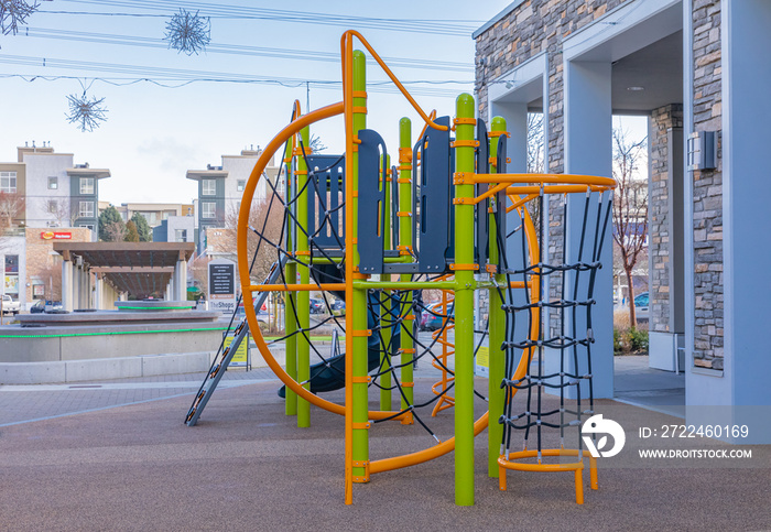 Colorful playground on yard. Soft coating for children’s playgrounds from rubber crumb.