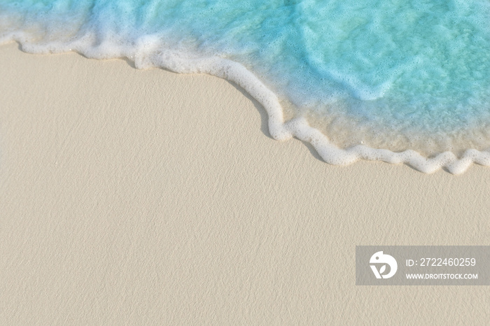 Soft waves of blue sea on the Maldives beach for the background.