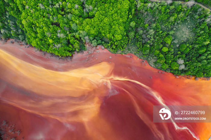 Drone view of contaminated, toxic water stream in Geamana, Romania