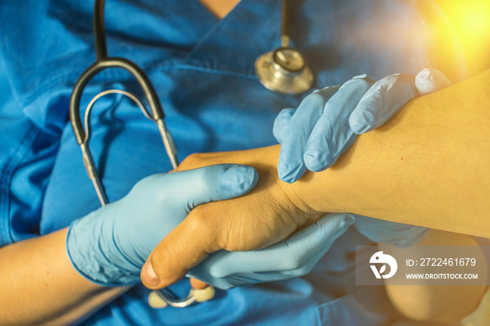 Doctor’s gloved hand comforting cancer patient, cancer gene DNA research, cancer early detection