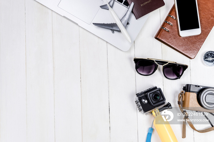 Business Travel Blogger objects and equipment on white wooden copy space