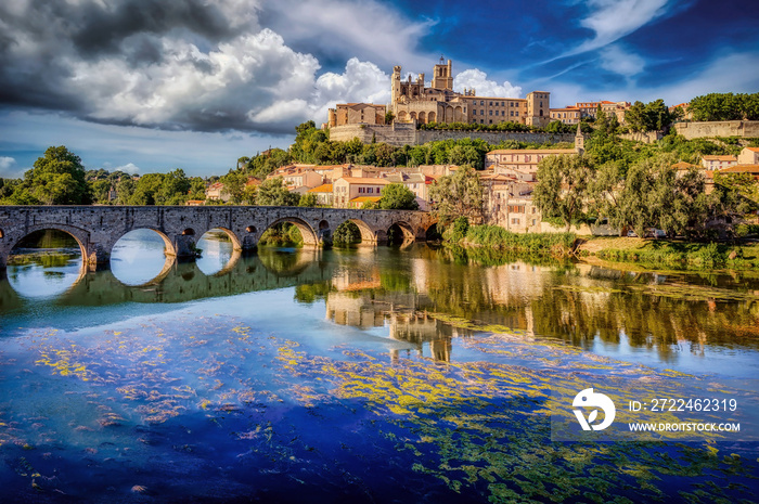 The Old Bridge (Pont Vieux) at Beziers and Sainte Nazaire Cathedral, overlooking the River Orb, in the Herault Department of the Languedoc region of France