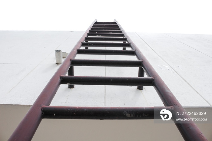 Old vertical industrial metal rusted ladder. Staircase to Water