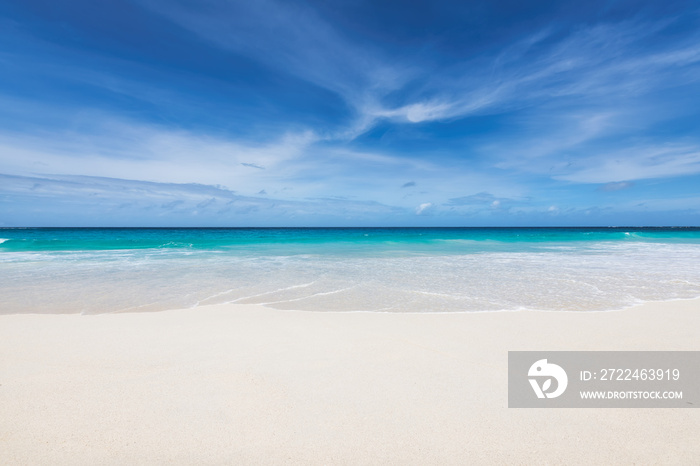 Tropical beach and turquoise sea. Luxury travel summer holiday background concept.