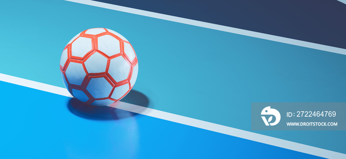 White orange futsal ball on blue indoor soccer field concept background